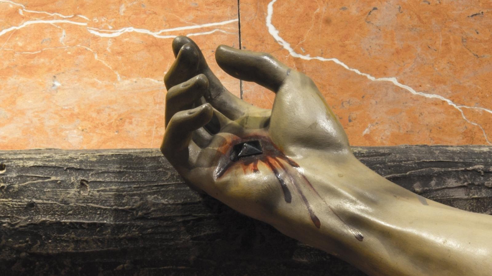 Slider Hand Kreuzigung